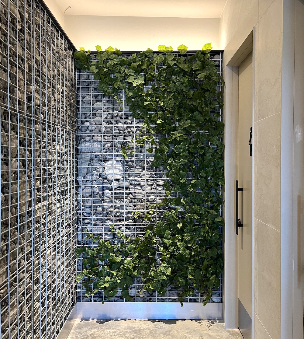 Artificial ivy green wall used as restaurant decor in Vancouver.